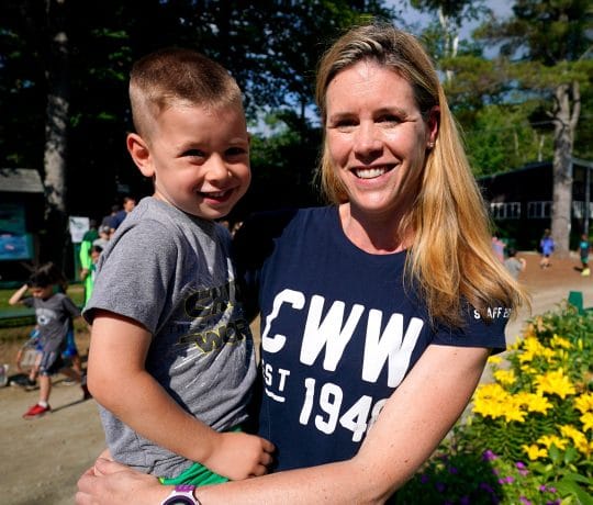 woman holding a young boy