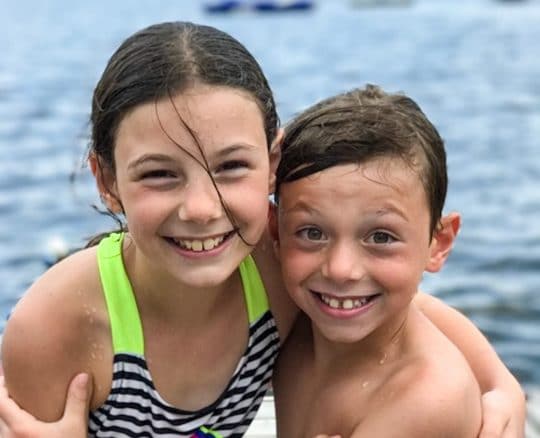 young boy and girl after a swim