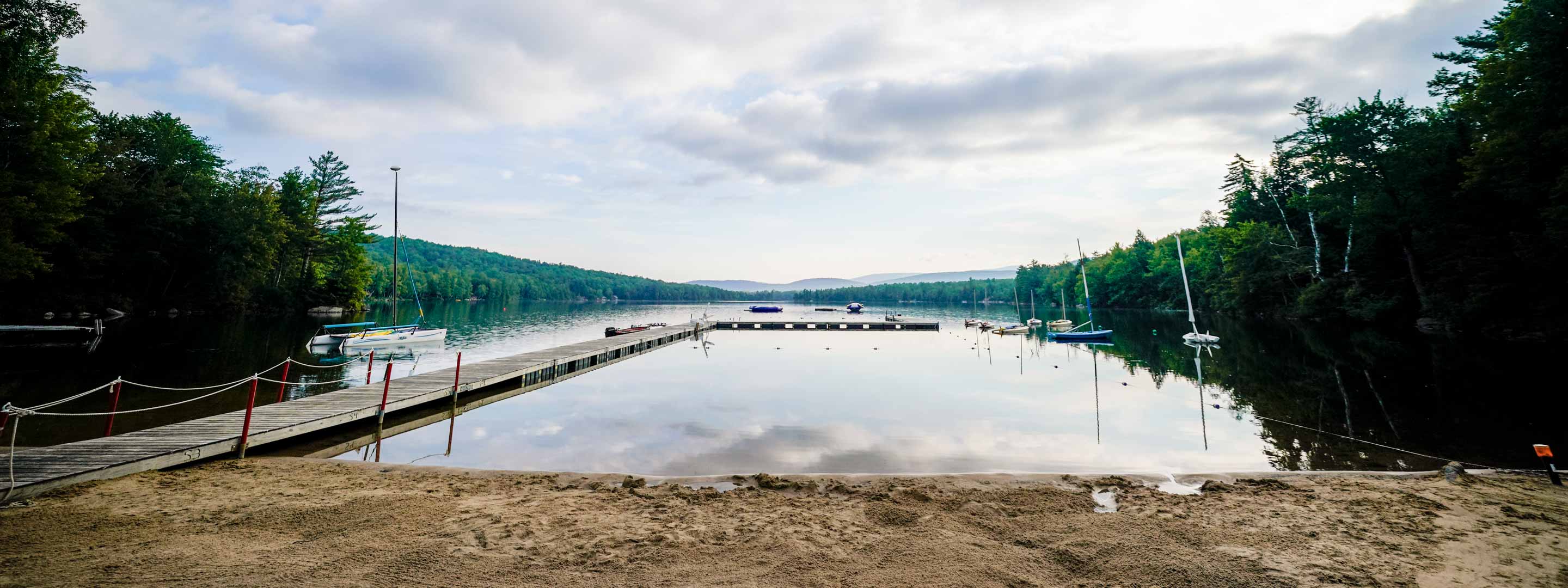 serene lake and a partly cloudy day