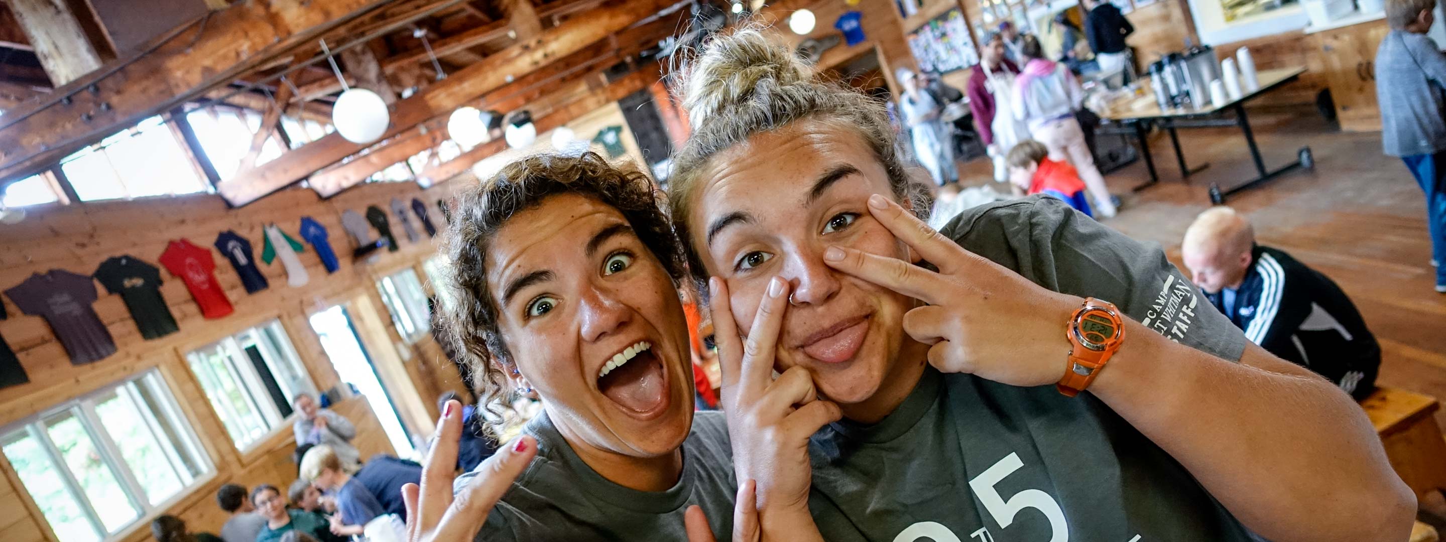 two camp counselors having fun