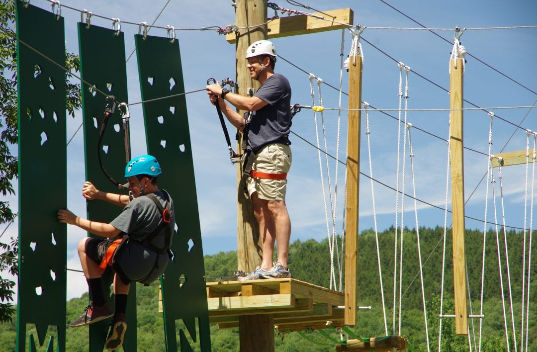 Dad on ropes course at Camp Walt Whitman