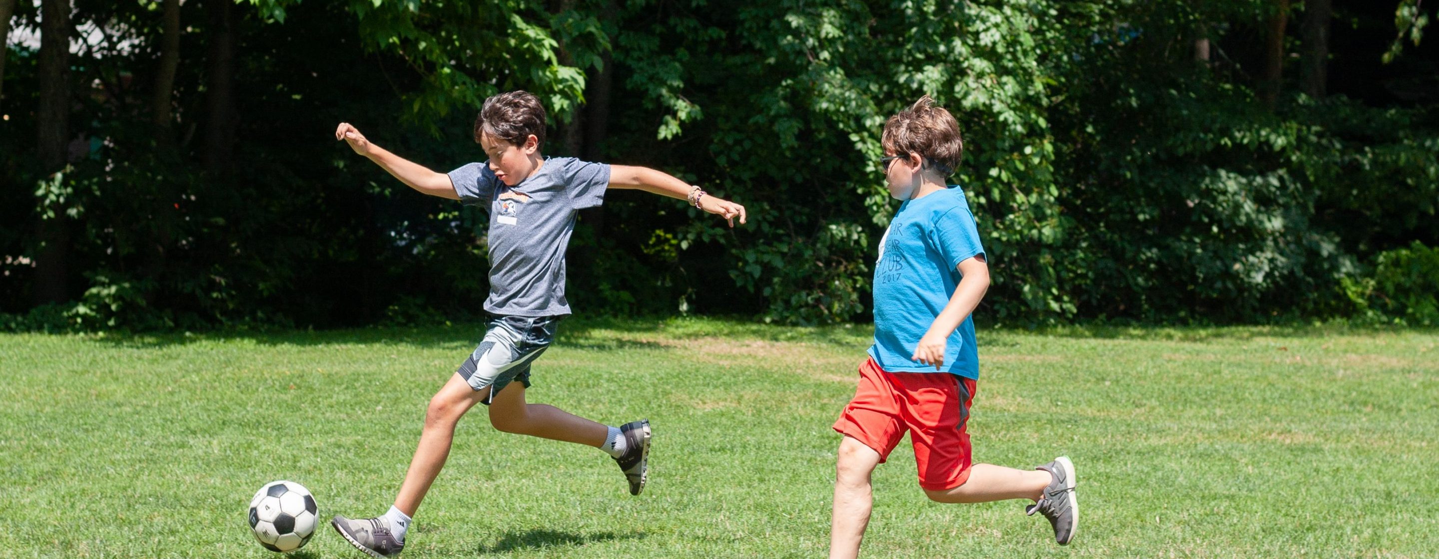 Kids Playing Soccer at Camp