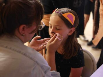 girl getting her face painted